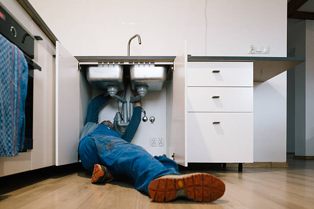 Professional Emergency Plumber technician working in Columbus, WI